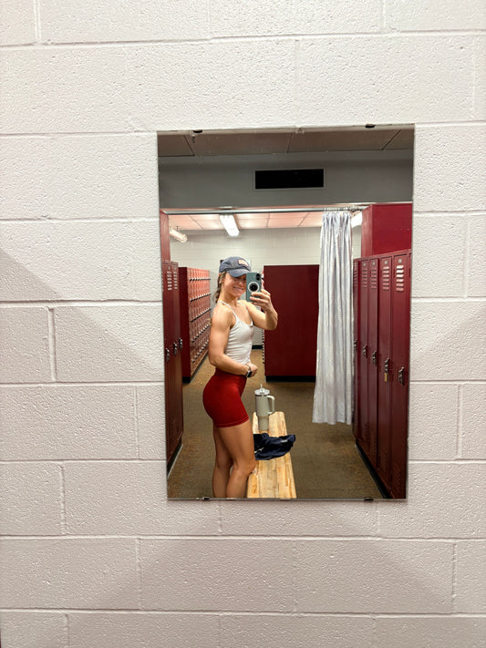 Not Another Fitmom Flexing in the gym
